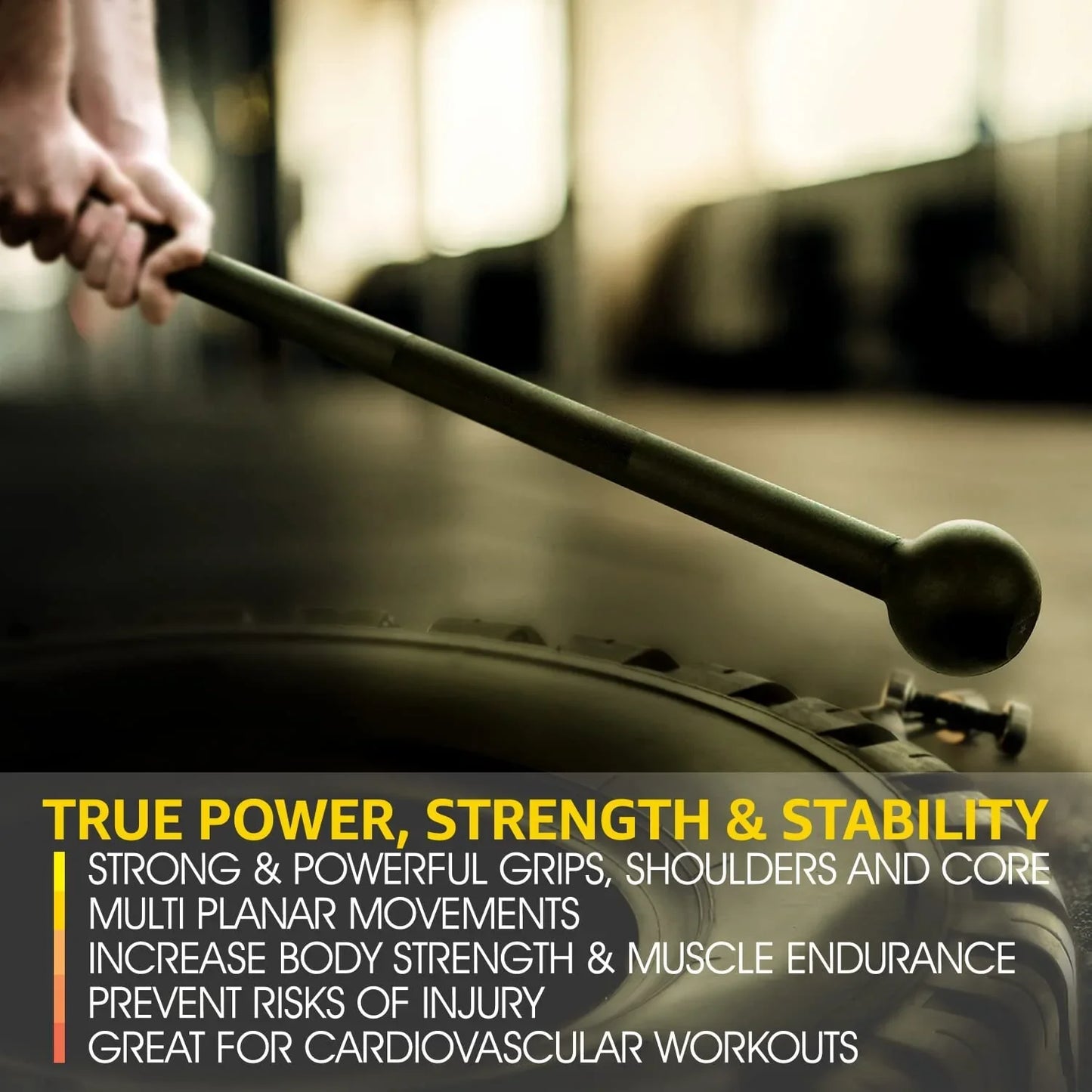 Athlete using steel mace for strength training on tire, fitness equipment in gym setting