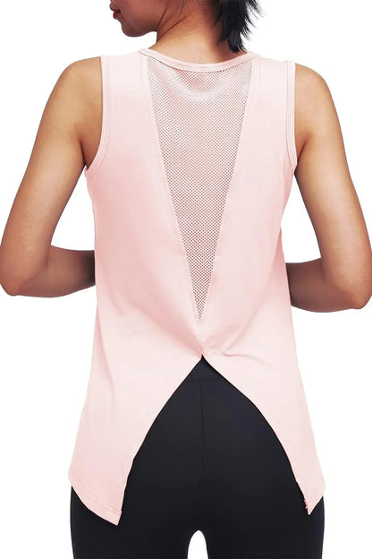 Woman wearing a pink sleeveless workout top with mesh back panel and split hem