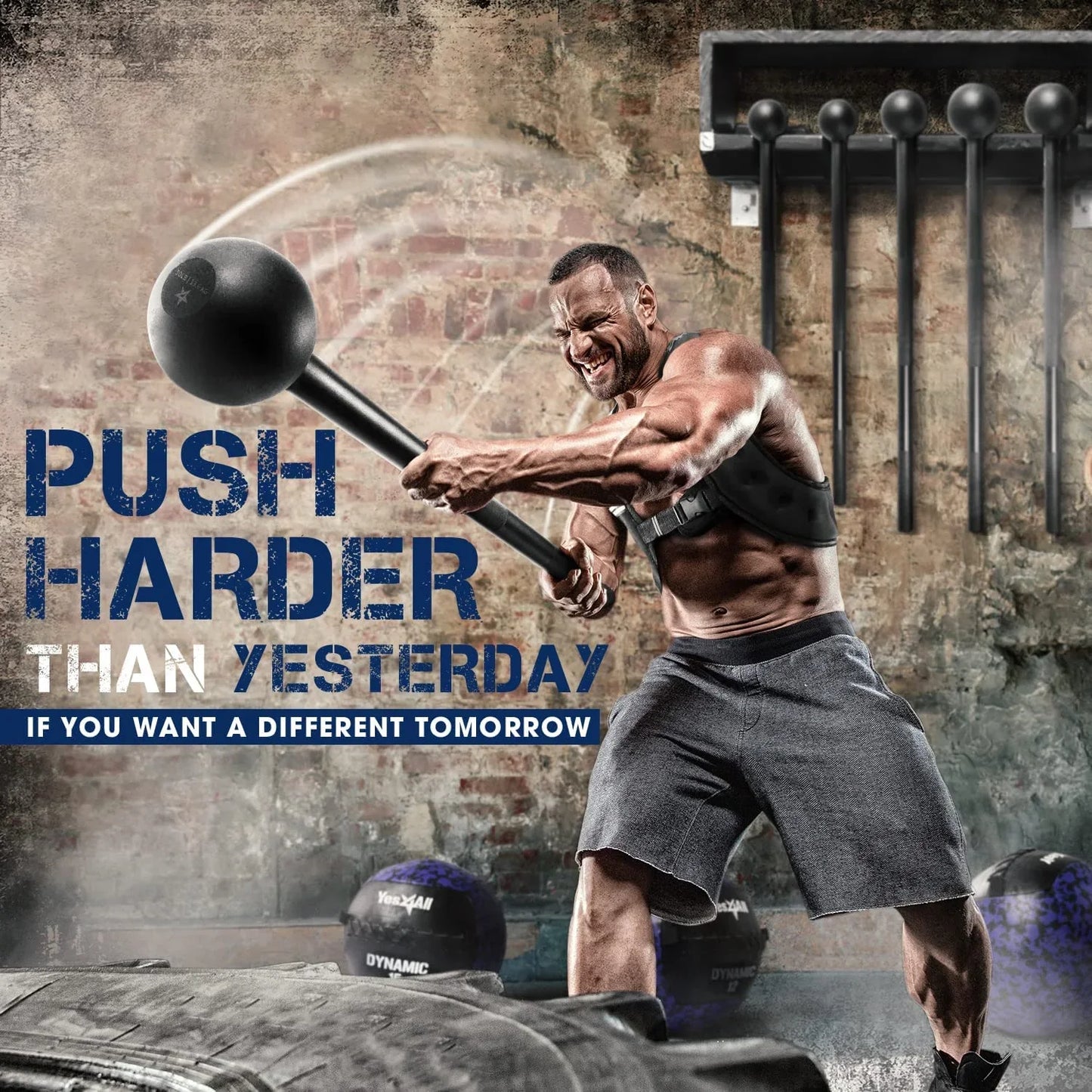 Muscular man swinging a steel mace in a gym with motivational text, fitness equipment visible.
